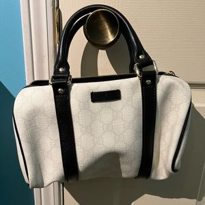 Authentic Gucci handbag with star clip accessory